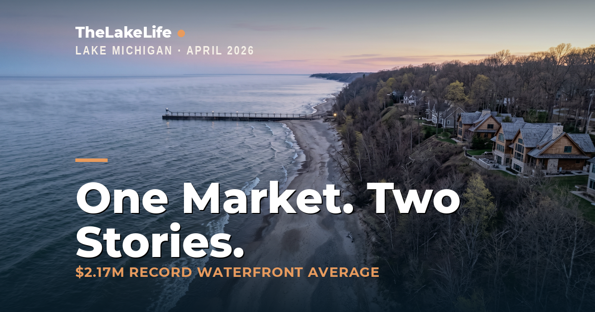 Aerial view of the Lake Michigan shoreline in Southwest Michigan at cool early spring dawn with a wide sandy beach, forested dune bluffs, and lakefront homes.